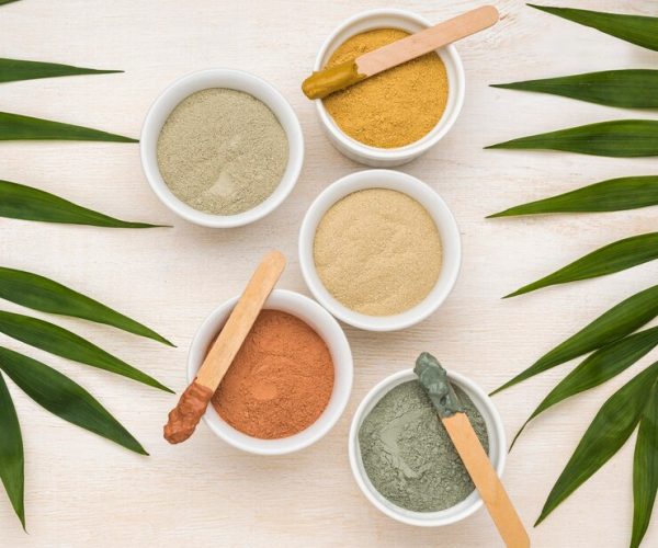 flat-lay-bowls-with-assortment-powders-leaves_23-2148774944